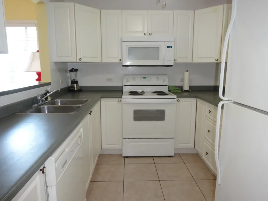 Fully equipped white kitchen at Sunset Paradise 3