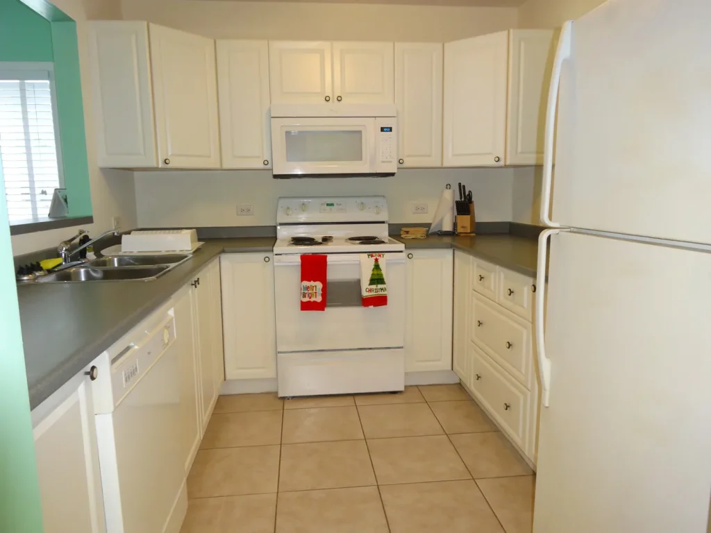 Fully equipped white kitchen at Sunset Paradise 1