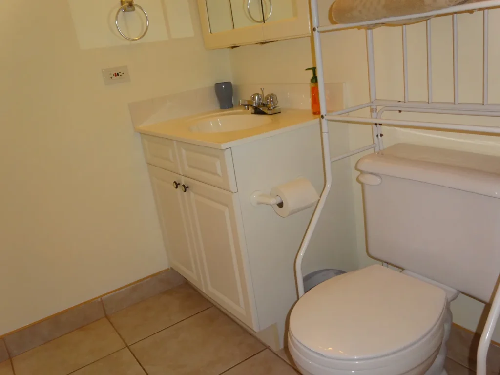 Bathroom vanity and WC at Sunset Paradise 1