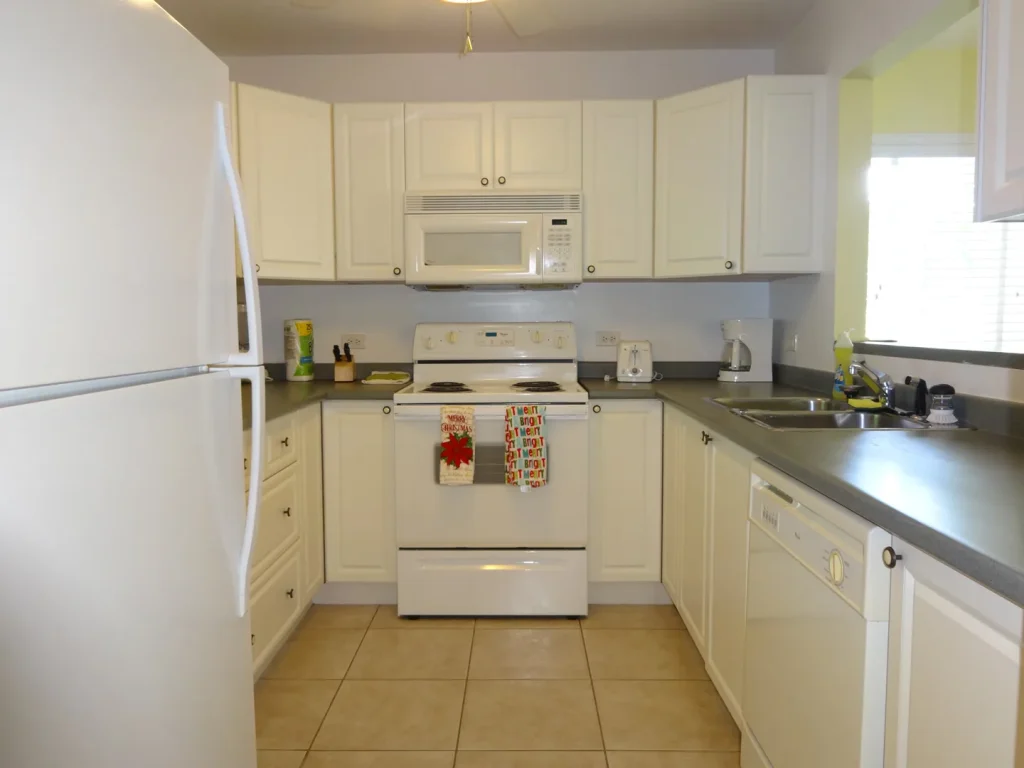 Fully equipped white kitchen at Sunset Paradise 2