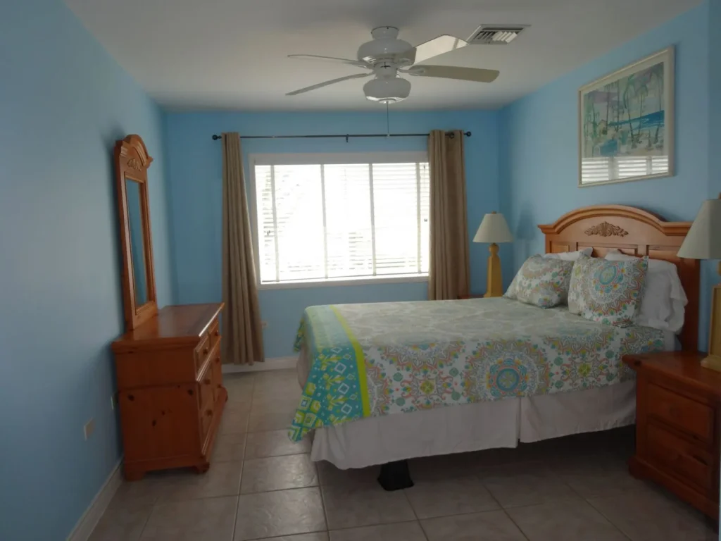 Blue king bedroom at Sunset Paradise 4