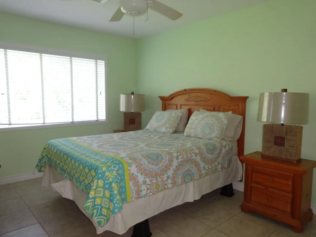 Green king bedroom at Sunset Paradise 4